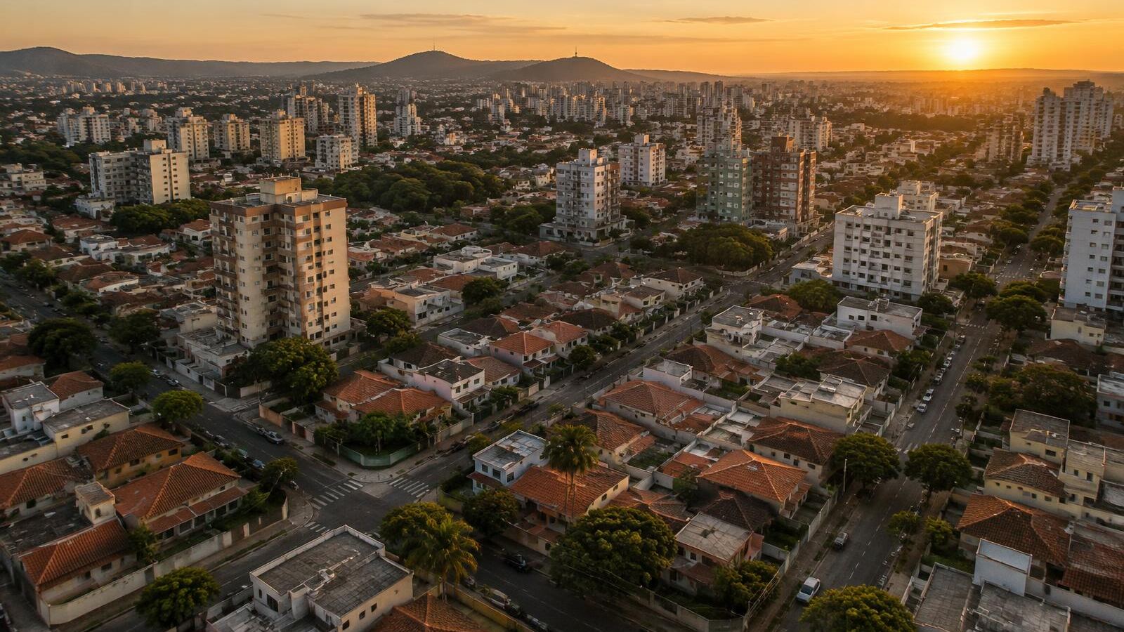 Vista aérea de bairro com casas e edifícios de média altura, ilustrando diferentes zonas de uso urbano